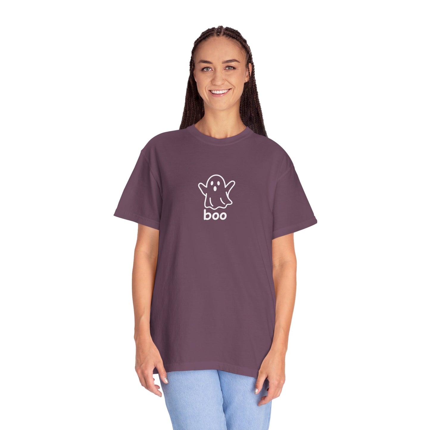 Person wearing a purple t-shirt with a ghost and 'boo' graphic on a white background