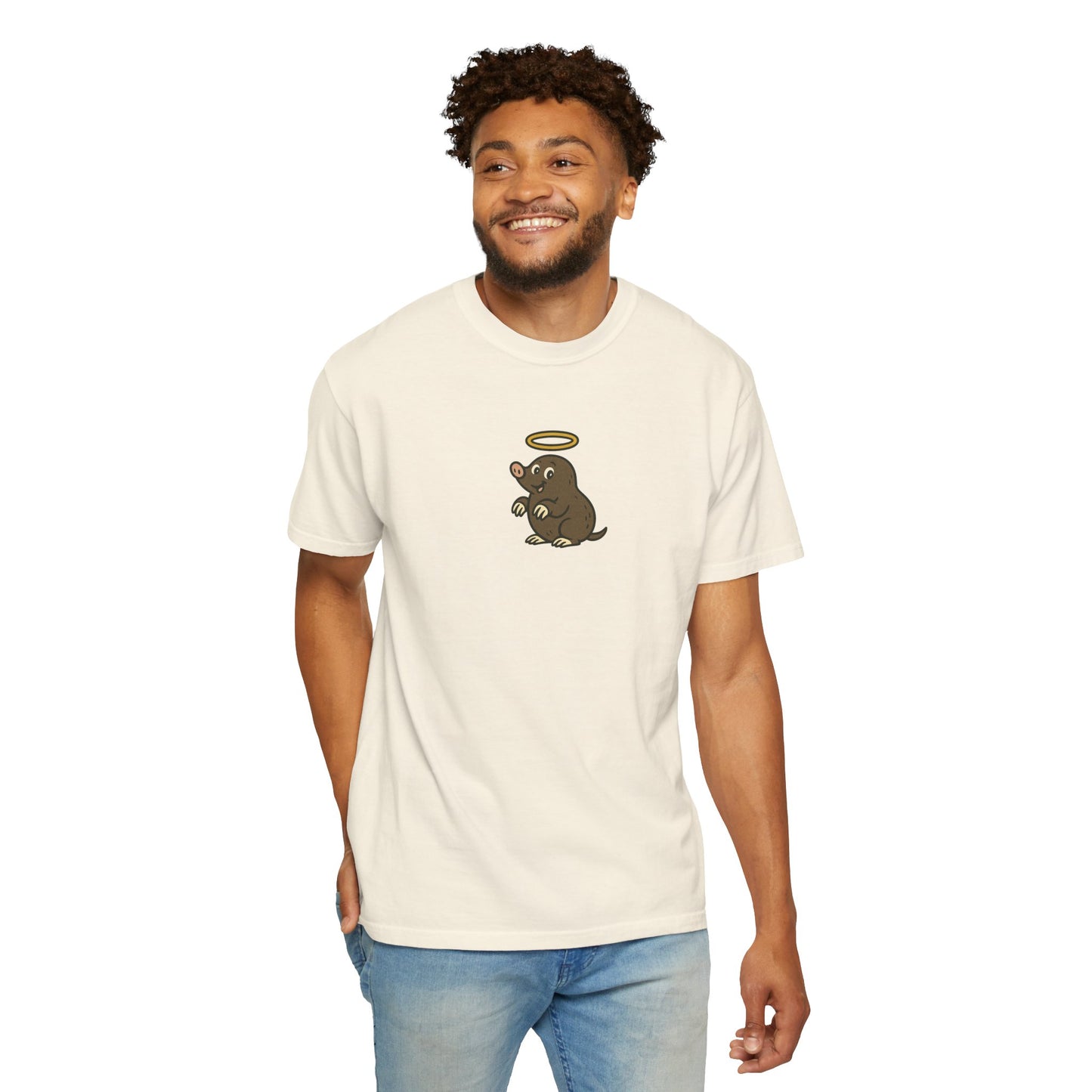 Man wearing a cream t-shirt with a graphic design on a white background