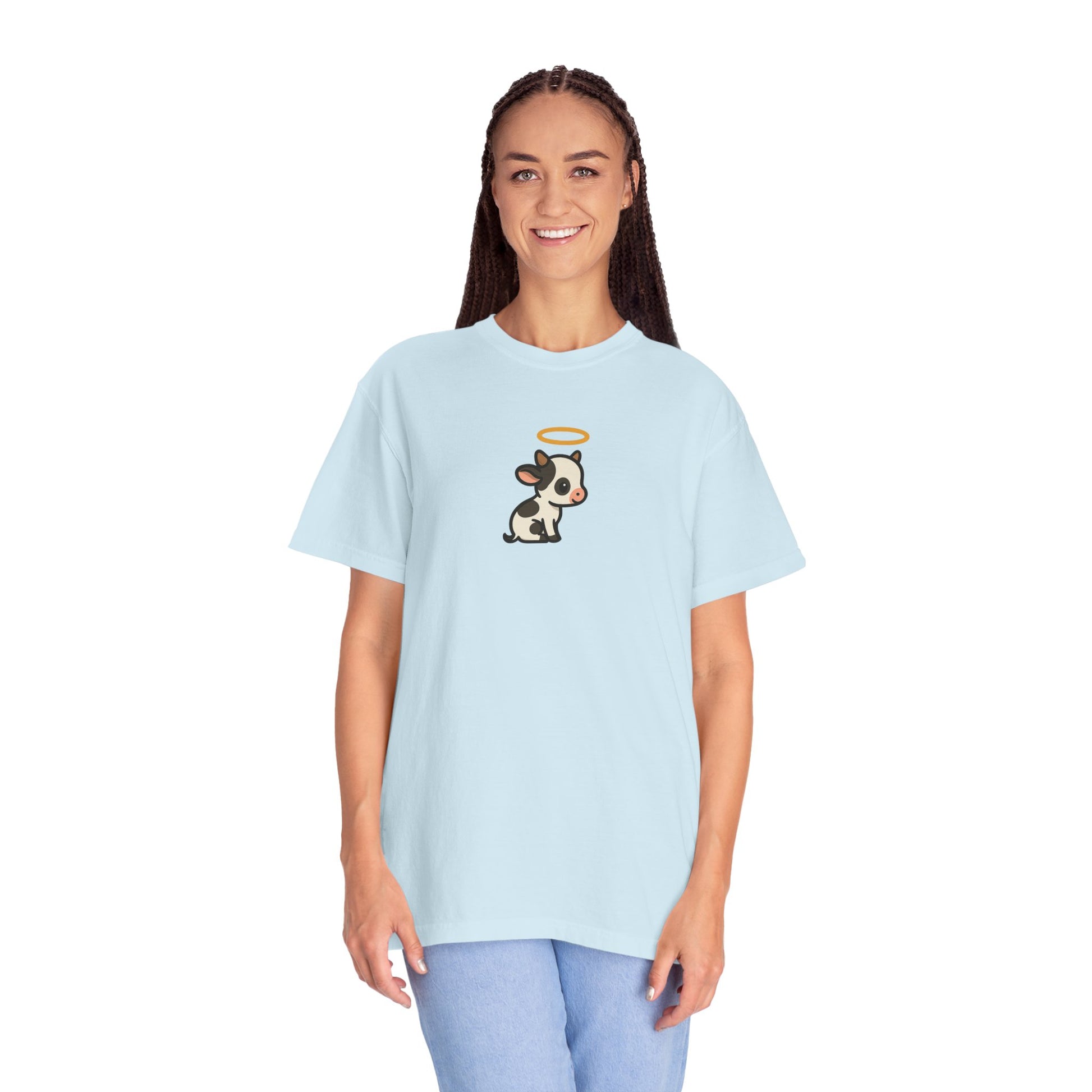 Person wearing a light blue t-shirt with a holy cow graphic on a white background