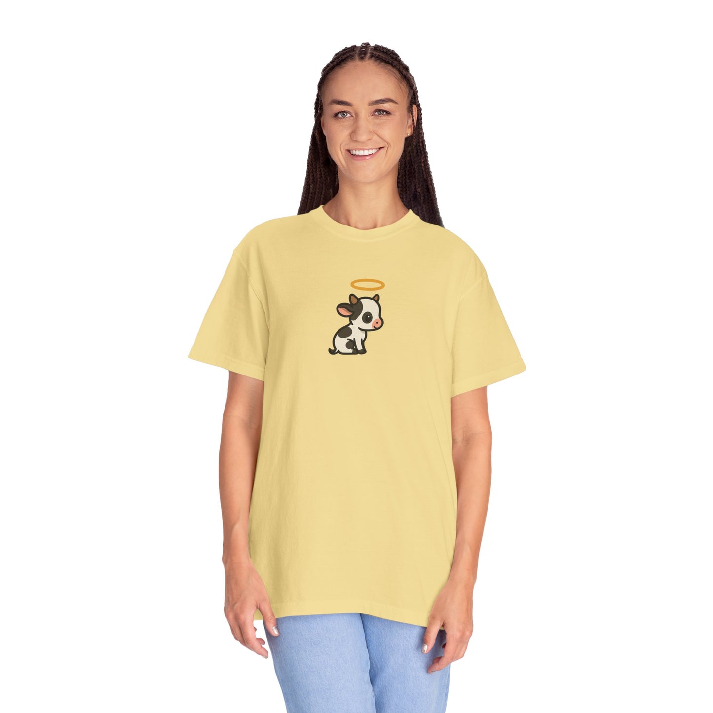 Person wearing a yellow t-shirt with a holy cow graphic on a white background