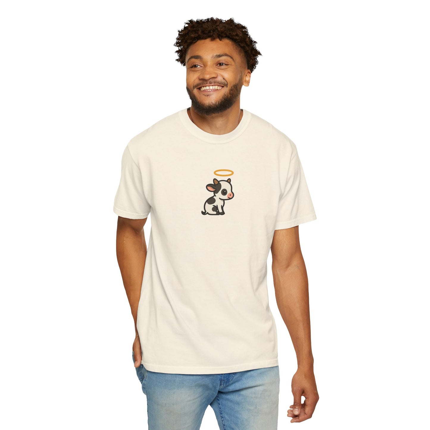 Man wearing a cream t-shirt with a holy cow graphic on a white background