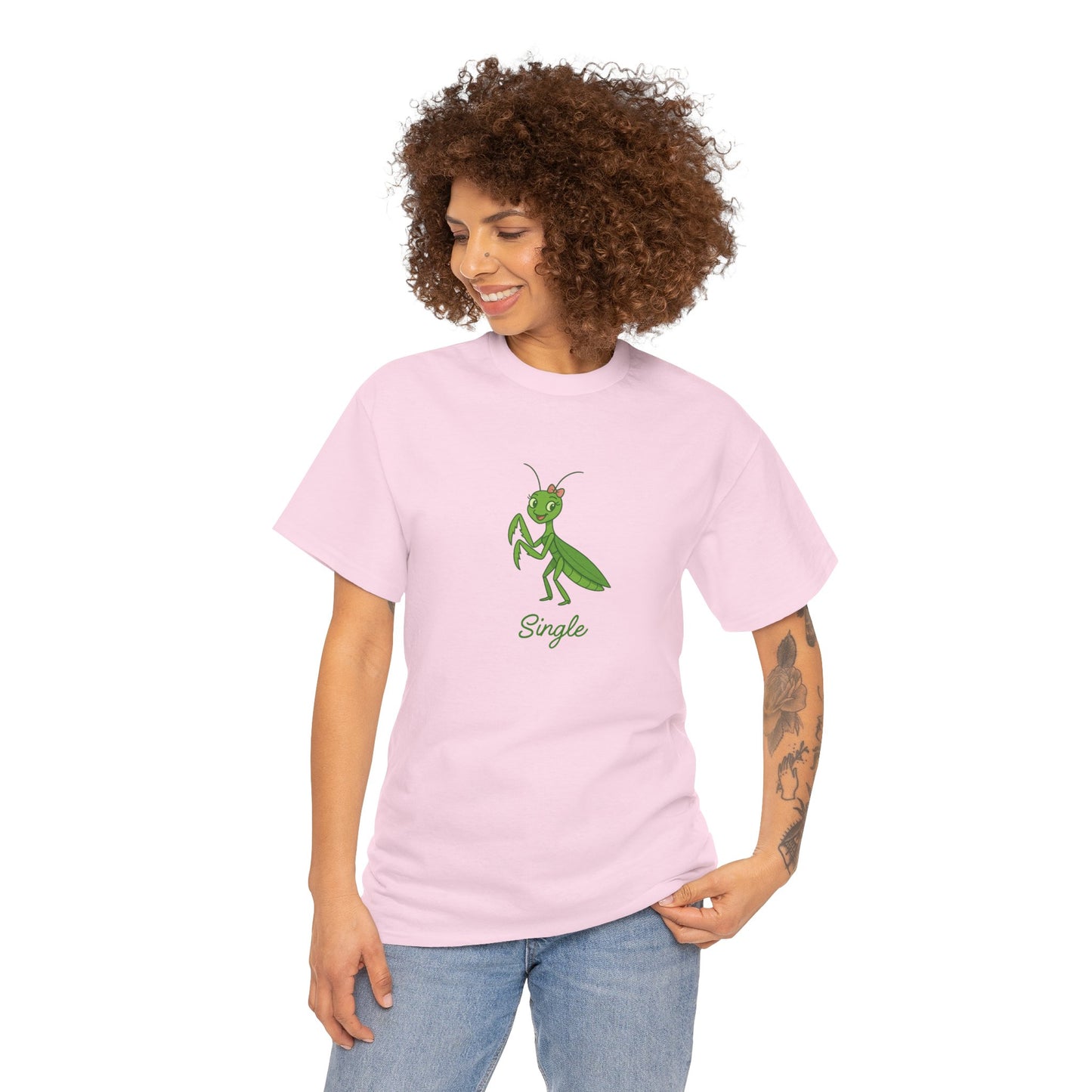Woman wearing a pink t-shirt with a green praying mantis graphic and the word 'Single'.