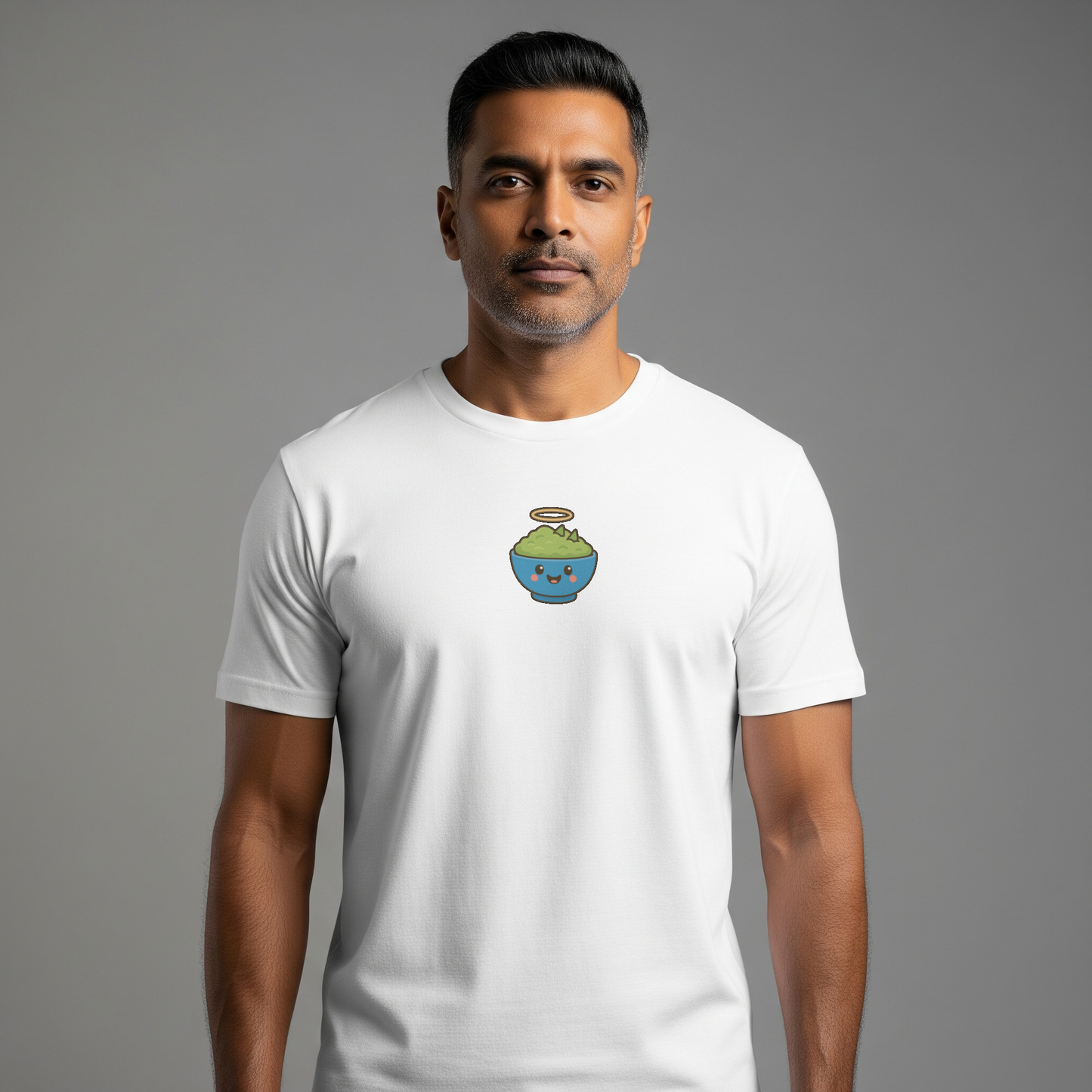 Man wearing a white t-shirt with a graphic design on a gray background
