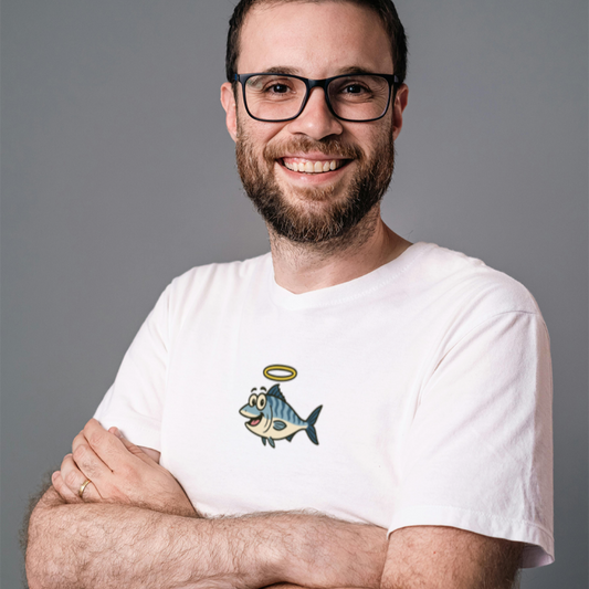 Man wearing a white t-shirt with a graphic design on a gray background