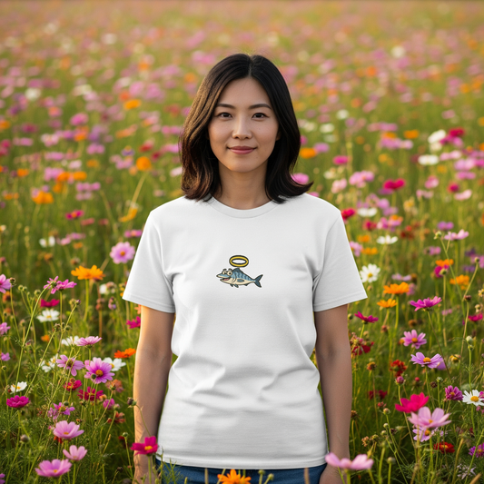 Woman wearing a white t-shirt with a graphic design in a field of flowers