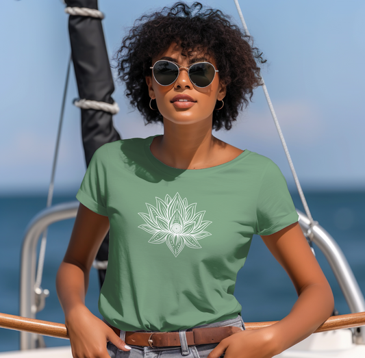 Woman wearing a green t-shirt with a white lotus design on a boat