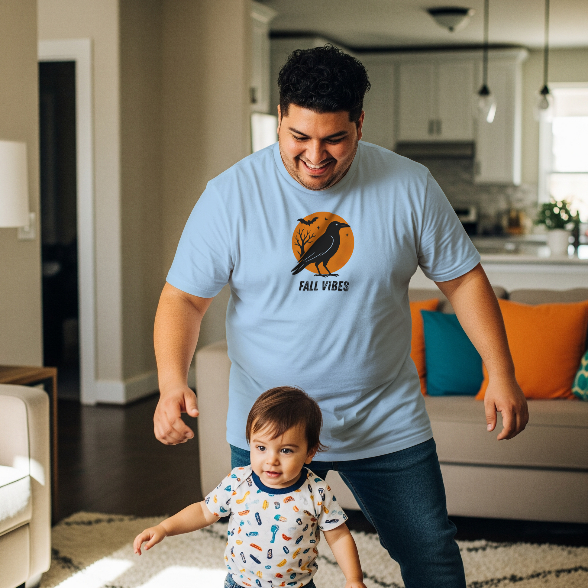 Man and child in a living room with a 'Fall Vibes' t-shirt