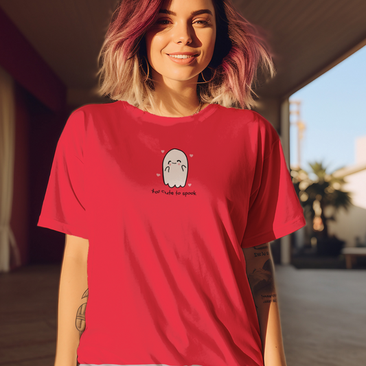 Person wearing a red t-shirt with a graphic design outdoors